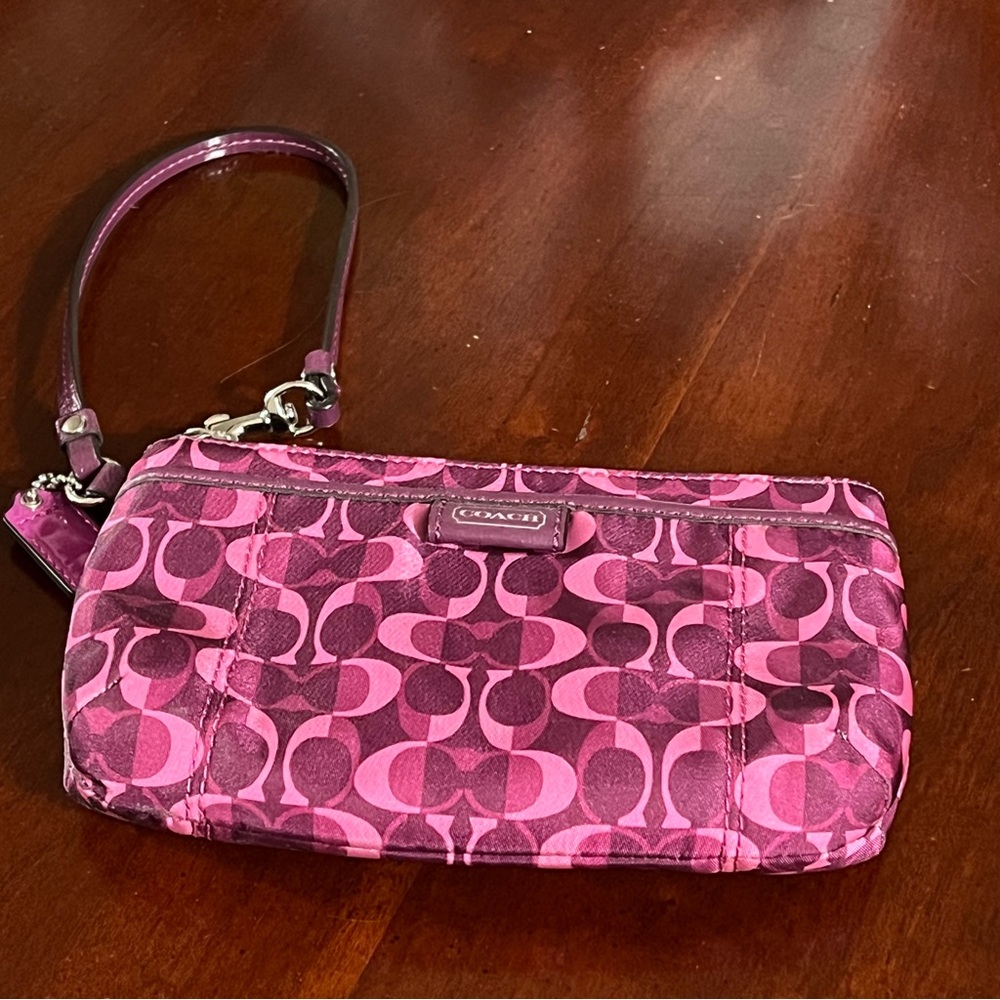 Coach wristlet GREAT condition, clean inside & out. Beautiful purple/pink color